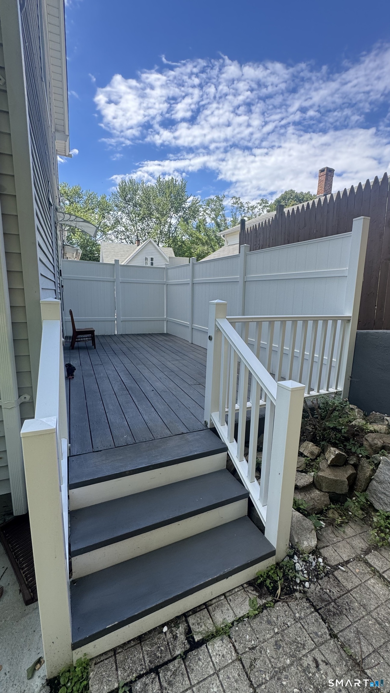 104 Prospect Street Ansonia, CT 06401 - Photo 12 of 40 a view of a backyard with sitting area