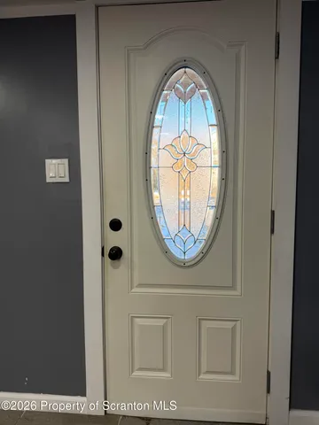 a kitchen with stainless steel appliances granite countertop a sink counter space cabinets and a large window