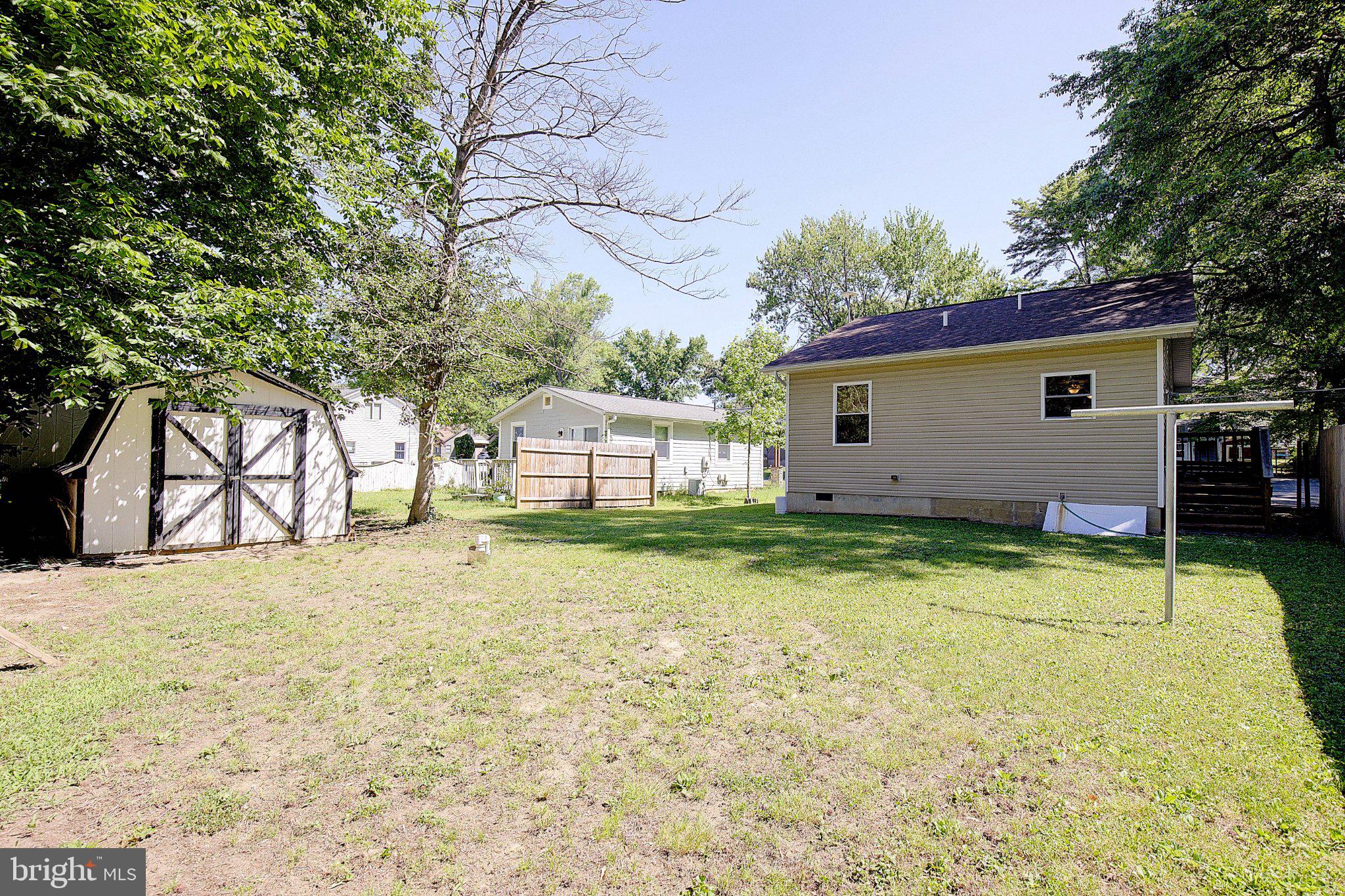 1718 Ridgely Road Edgewater, MD 21037 - Photo 16 of 19 Spacious backyard oasis awaits you!