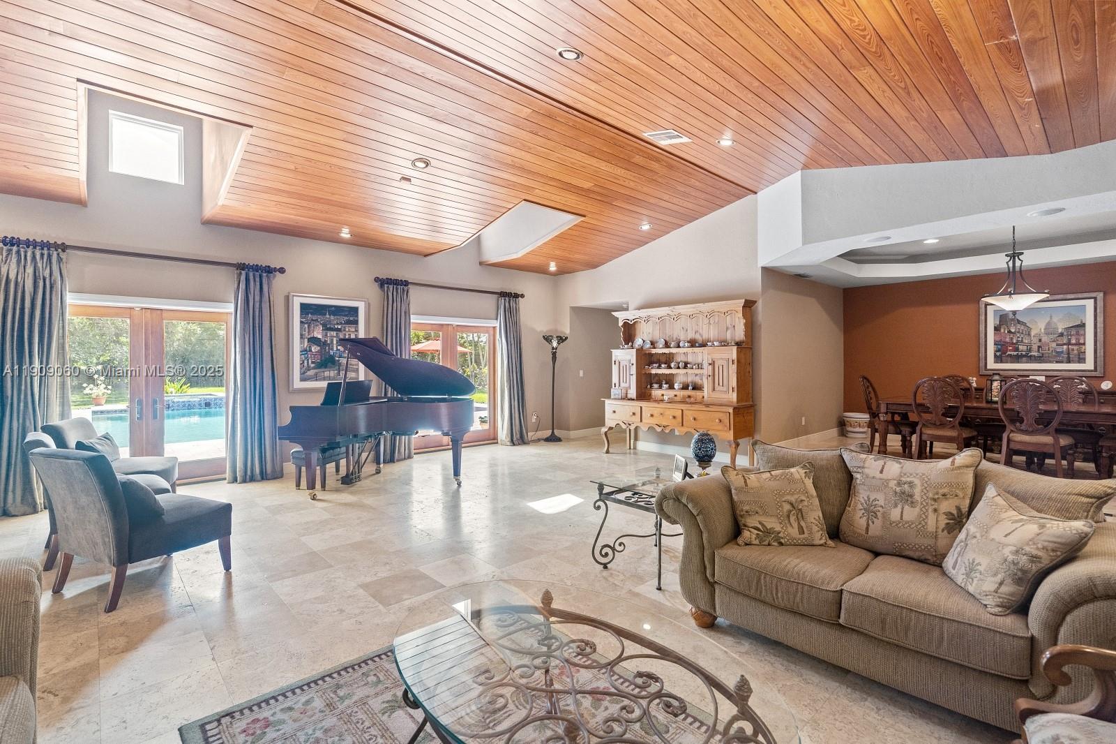 6500 Southwest 127th Street Pinecrest, FL 33156 - Photo 11 of 68 a view of a livingroom with furniture and a large window