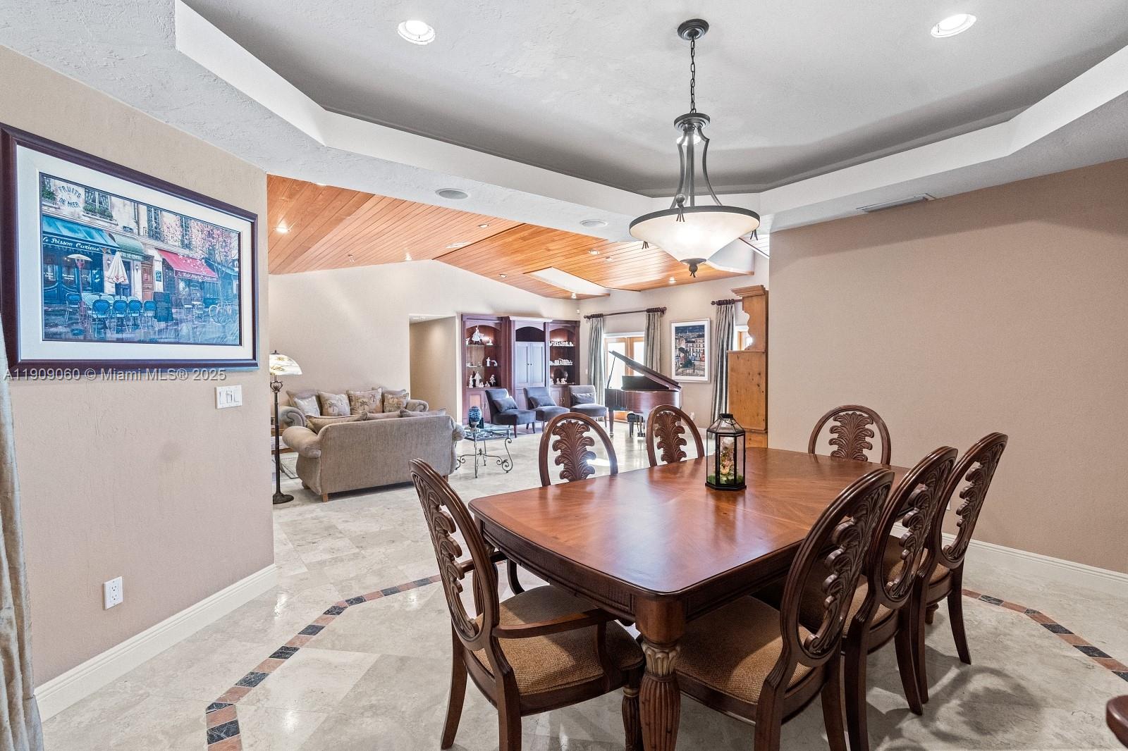 6500 Southwest 127th Street Pinecrest, FL 33156 - Photo 15 of 68 a dining room with furniture and window