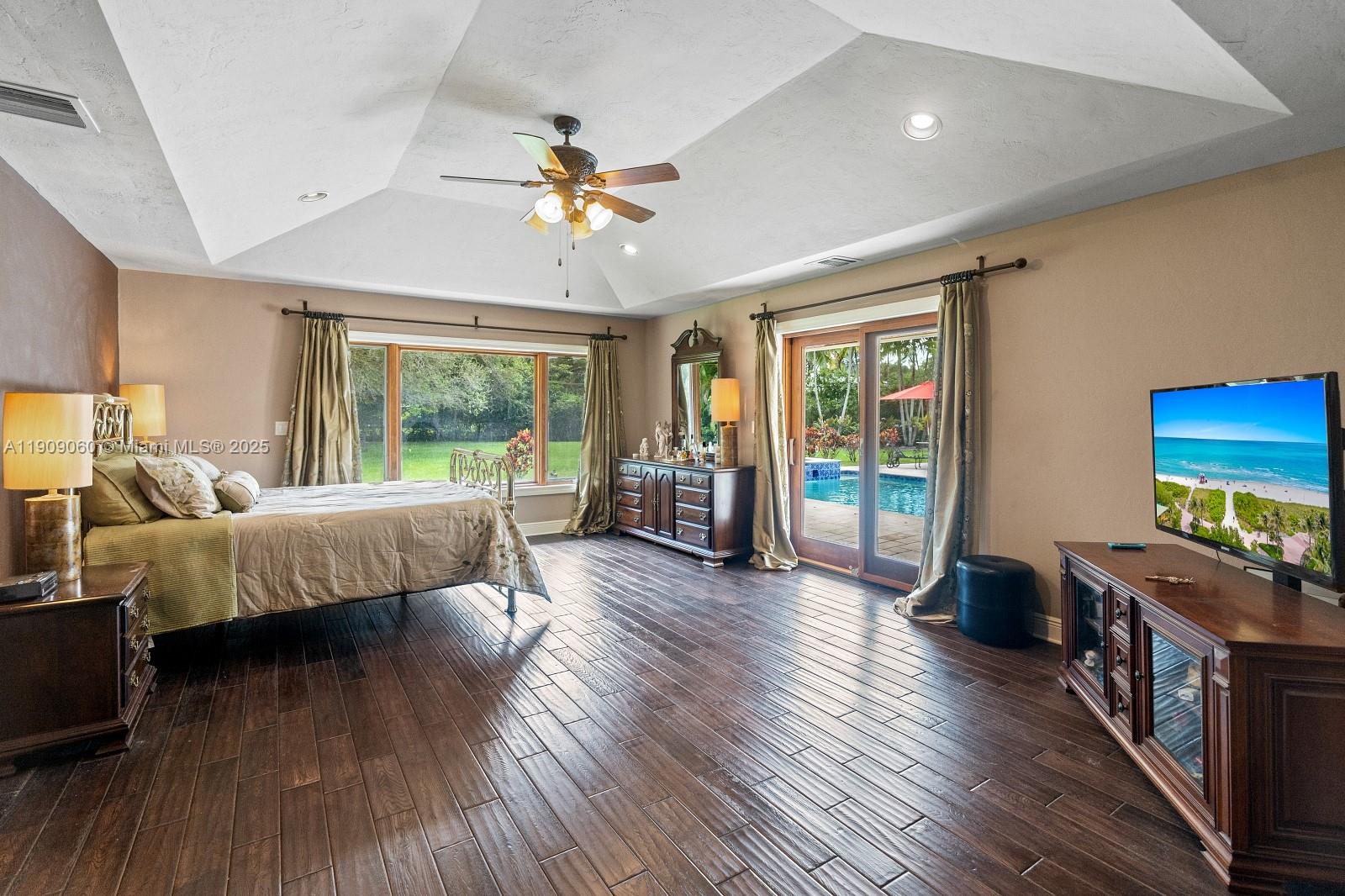 6500 Southwest 127th Street Pinecrest, FL 33156 - Photo 24 of 68 a living room with furniture and a wooden floor