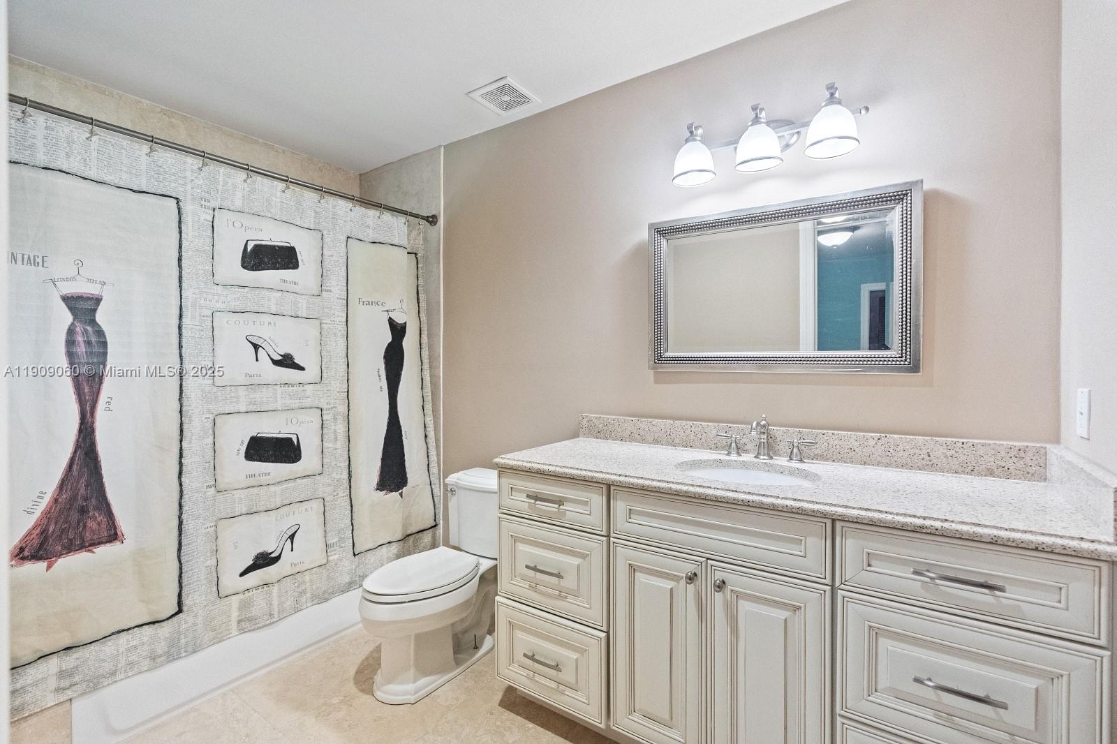 6500 Southwest 127th Street Pinecrest, FL 33156 - Photo 33 of 68 a bathroom with a sink a toilet and shower