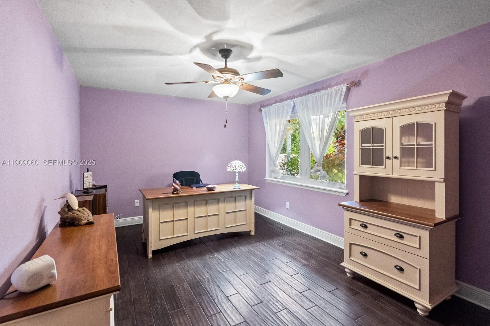 6500 Southwest 127th Street Pinecrest, FL 33156 - Photo 40 of 68 a bed room with a bed and a dresser