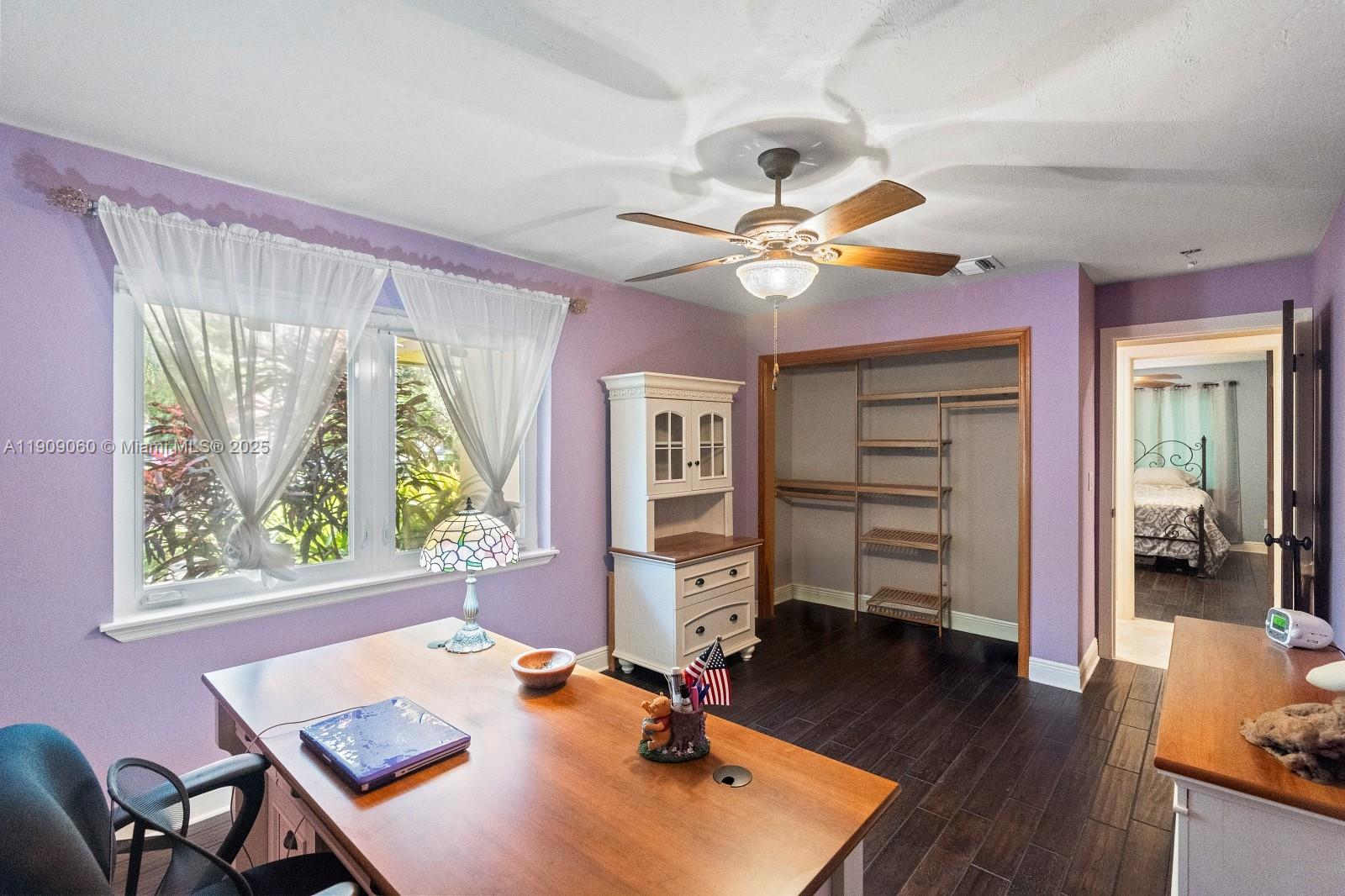 6500 Southwest 127th Street Pinecrest, FL 33156 - Photo 41 of 68 a workspace with furniture and a window