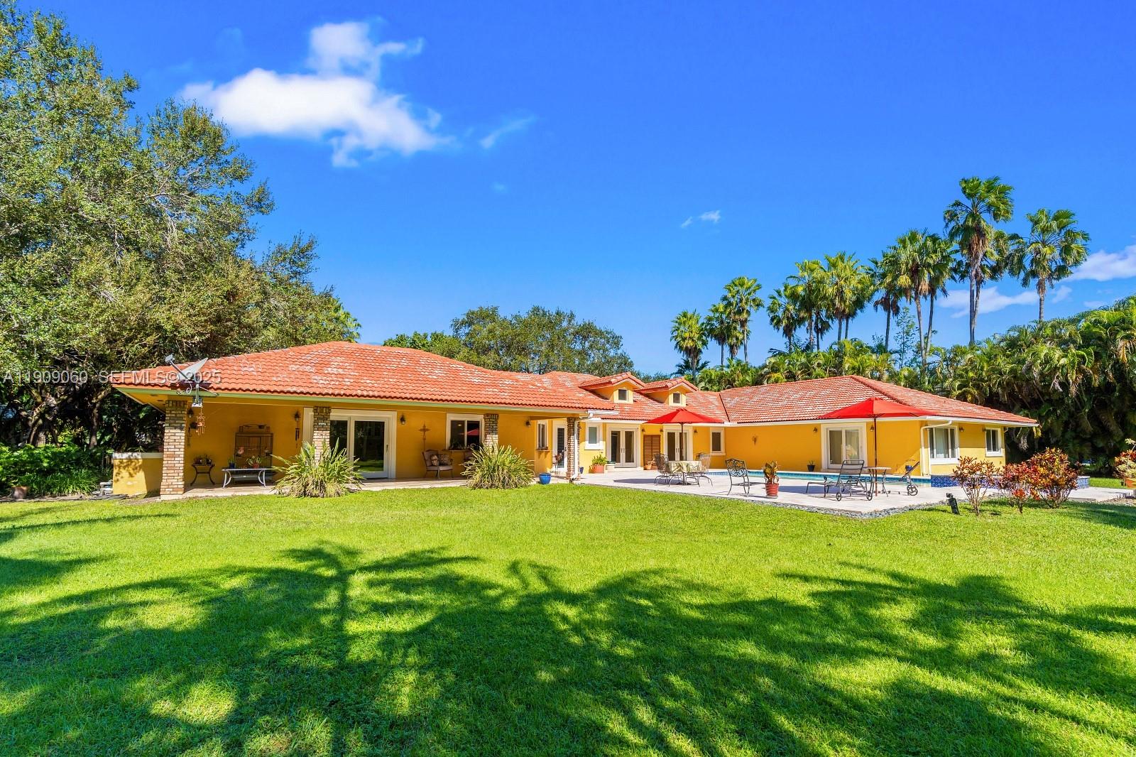 6500 Southwest 127th Street Pinecrest, FL 33156 - Photo 49 of 68 a view of a house with a big yard