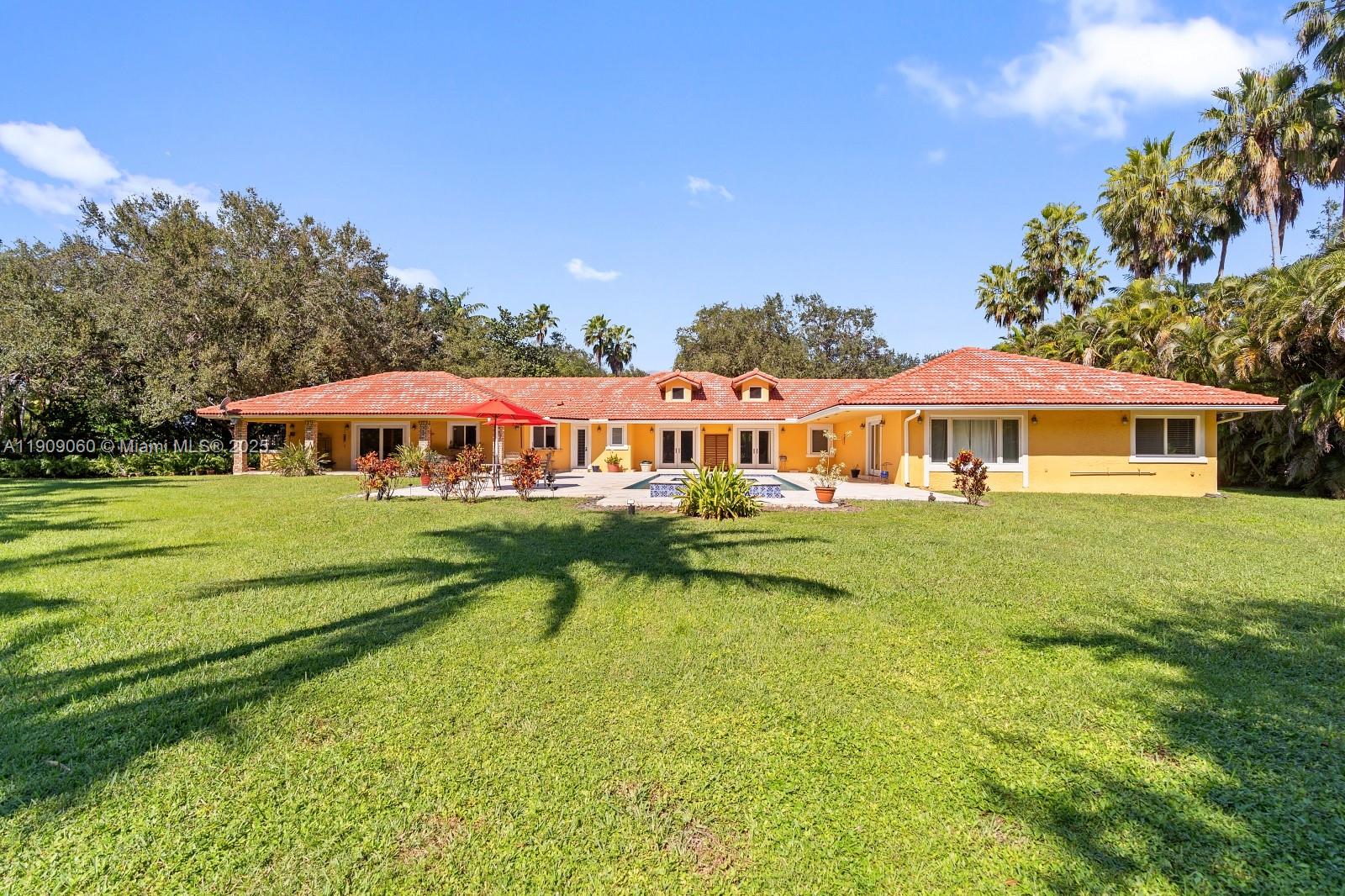6500 Southwest 127th Street Pinecrest, FL 33156 - Photo 53 of 68 a view of a house with a big yard