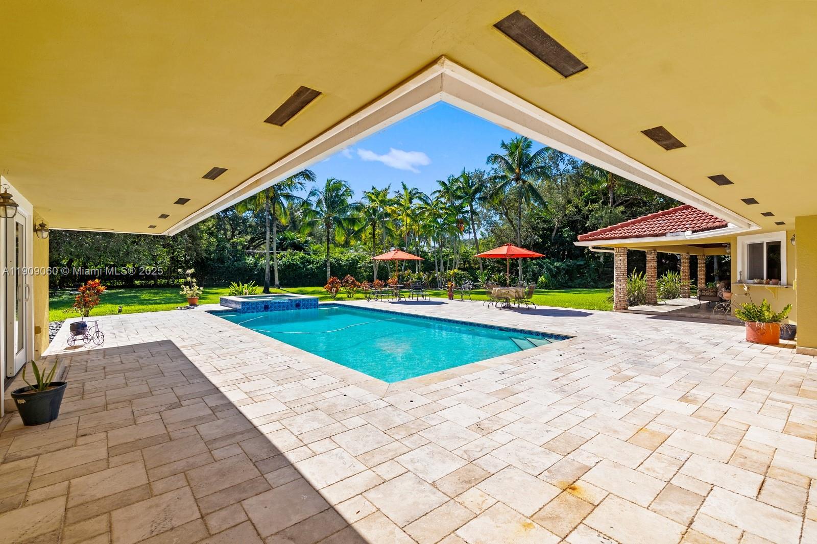 6500 Southwest 127th Street Pinecrest, FL 33156 - Photo 68 of 68 a view of outdoor space yard swimming pool and porch