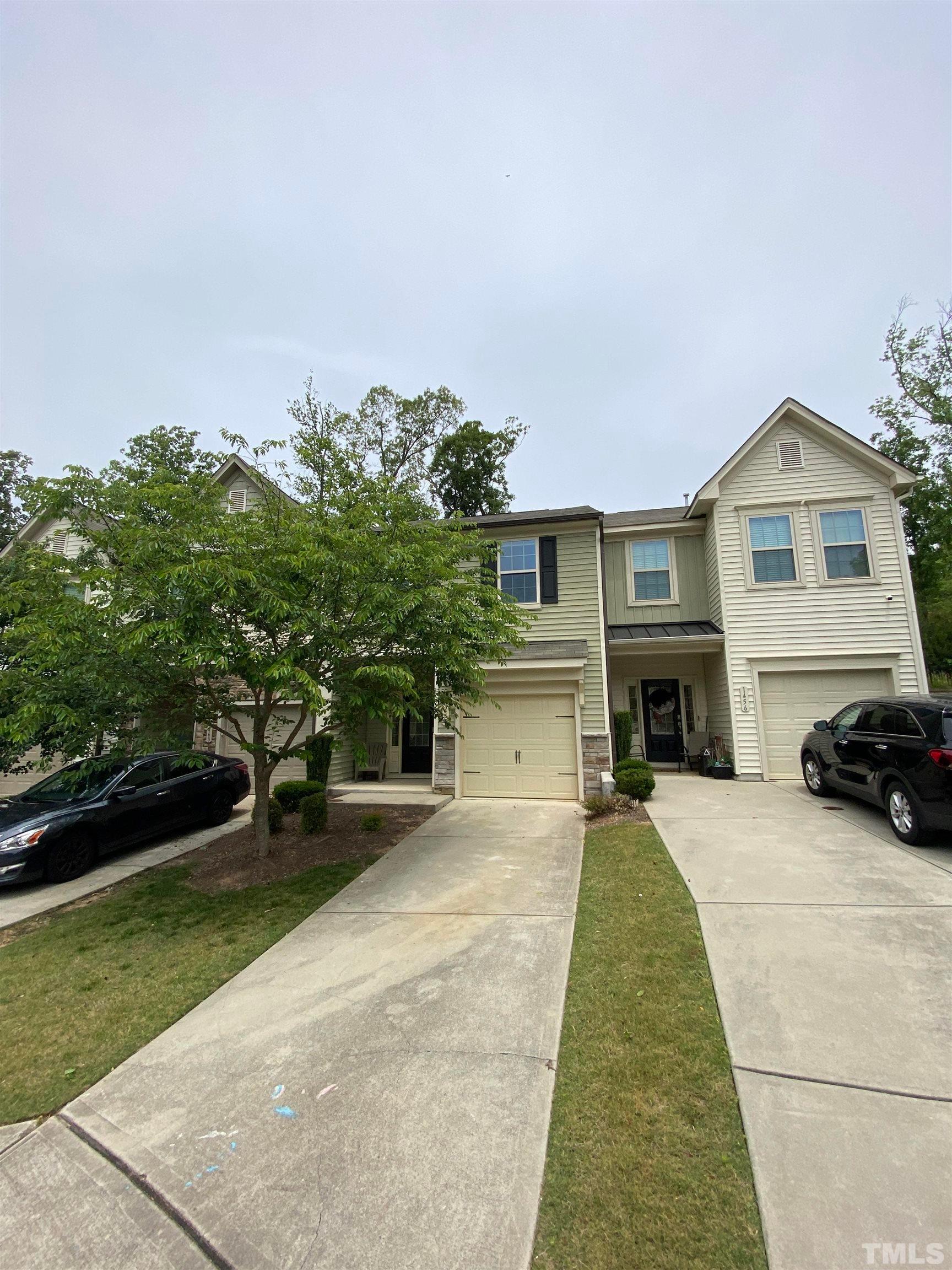 1458 Chatuga Way Wake Forest, NC 27587 - Photo 2 of 25 a view of house with yard