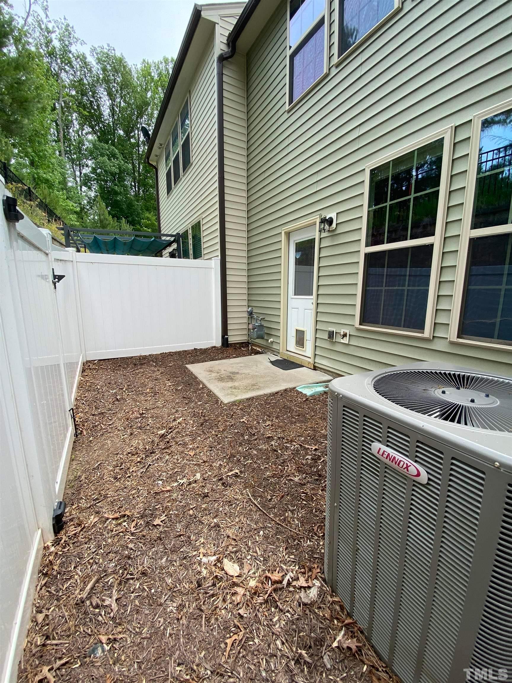 1458 Chatuga Way Wake Forest, NC 27587 - Photo 22 of 25 a backyard of a house