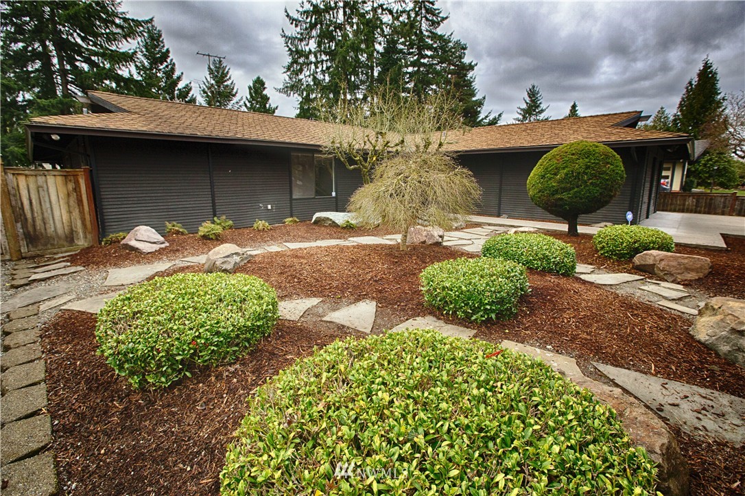 4601 Northeast 24th Street Renton, WA 98059 - Photo 4 of 25 a front view of a house with garden