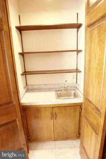 Wet bar is located in the family room.