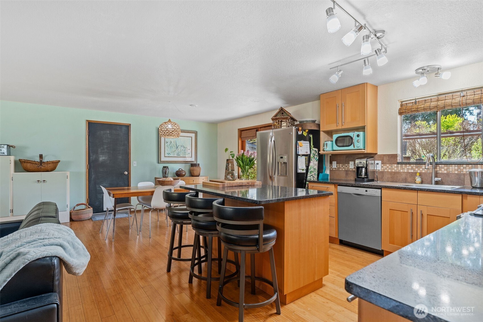 4405 Royal Court Carnation, WA 98014 - Photo 13 of 34 a living room with stainless steel appliances granite countertop furniture and a kitchen view