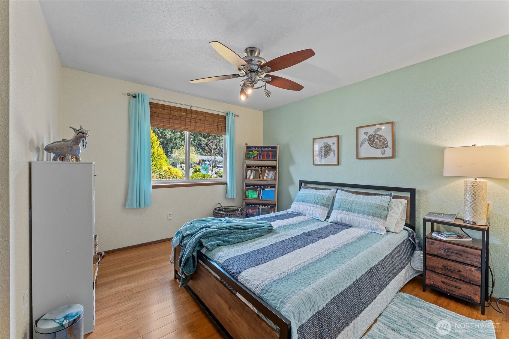 4405 Royal Court Carnation, WA 98014 - Photo 19 of 34 a bedroom with a bed and a chandelier