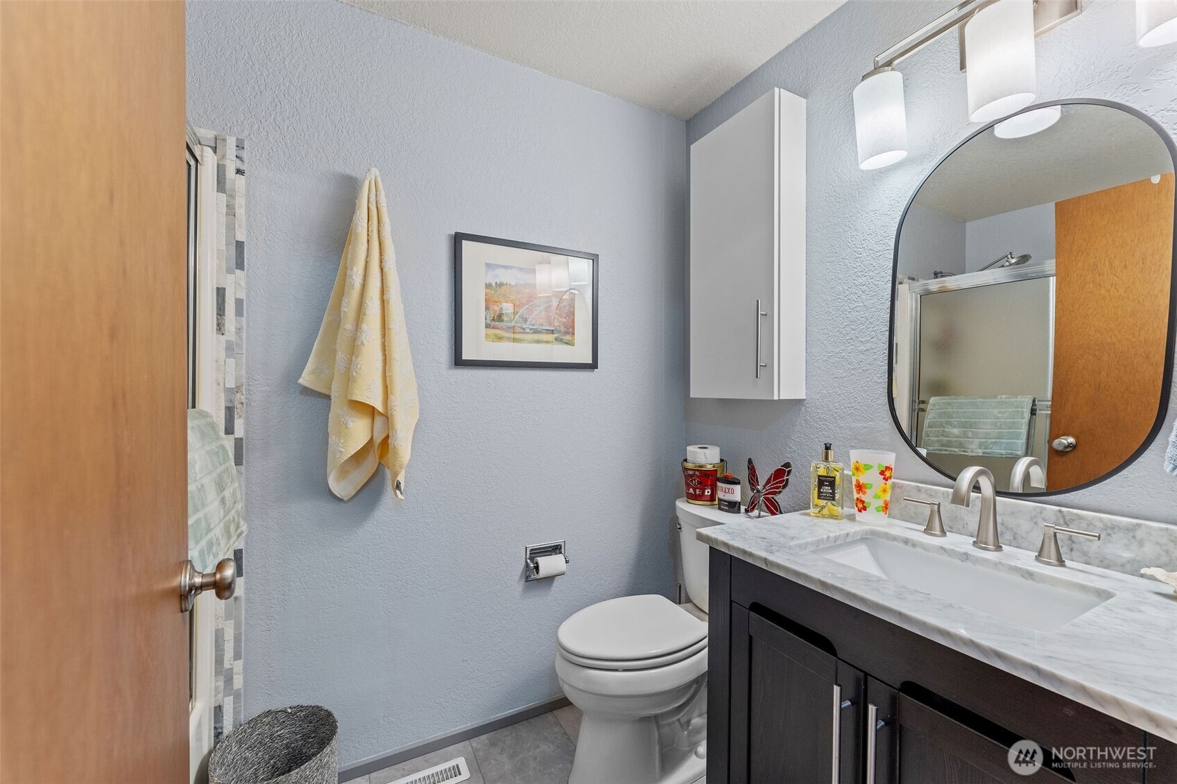 4405 Royal Court Carnation, WA 98014 - Photo 20 of 34 a bathroom with a sink mirror and toilet