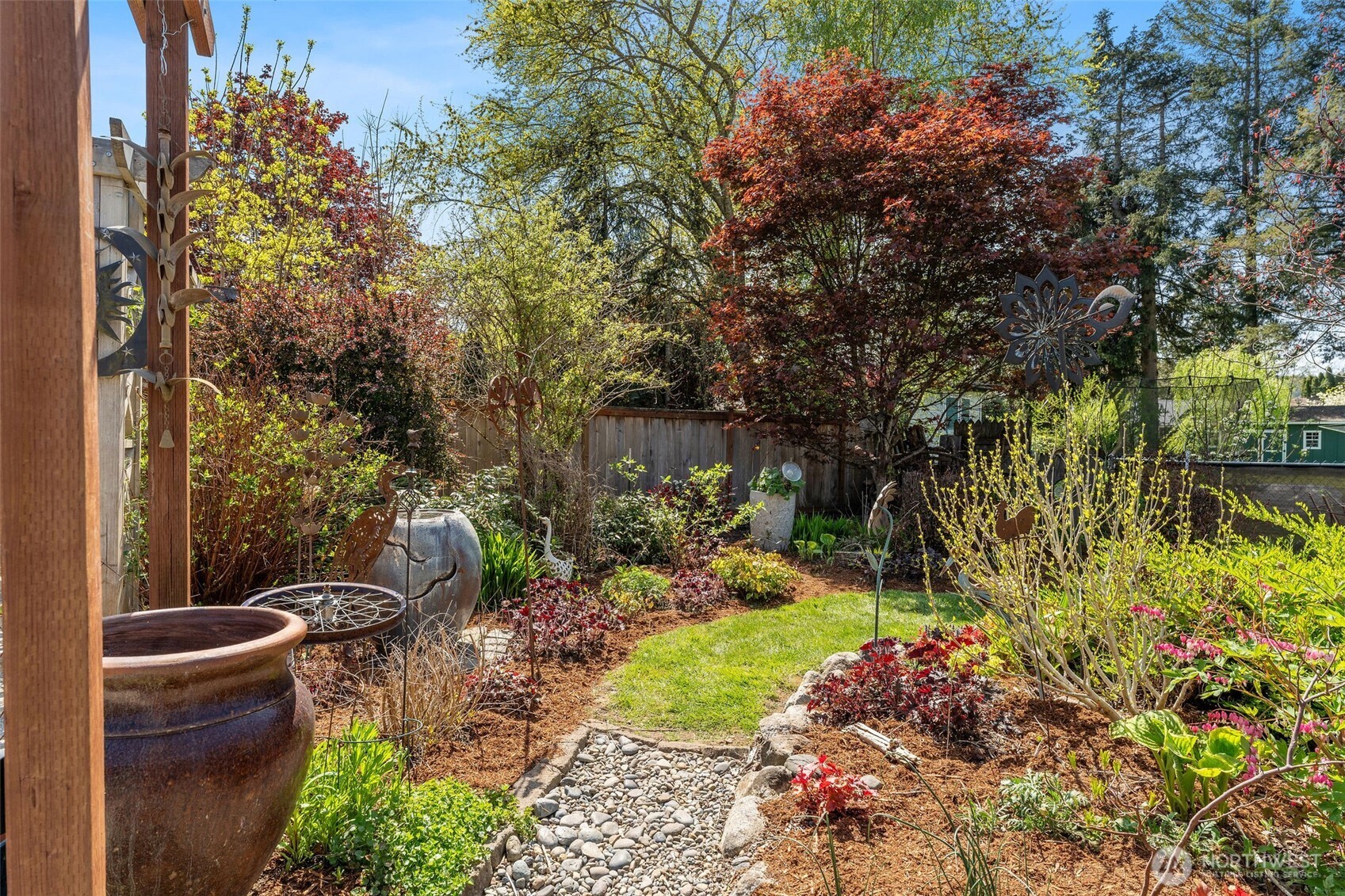 4405 Royal Court Carnation, WA 98014 - Photo 23 of 34 a view of a backyard with garden and plants