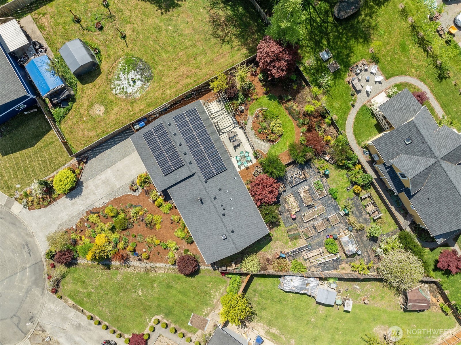 4405 Royal Court Carnation, WA 98014 - Photo 31 of 34 an aerial view of a house with a yard and lake view
