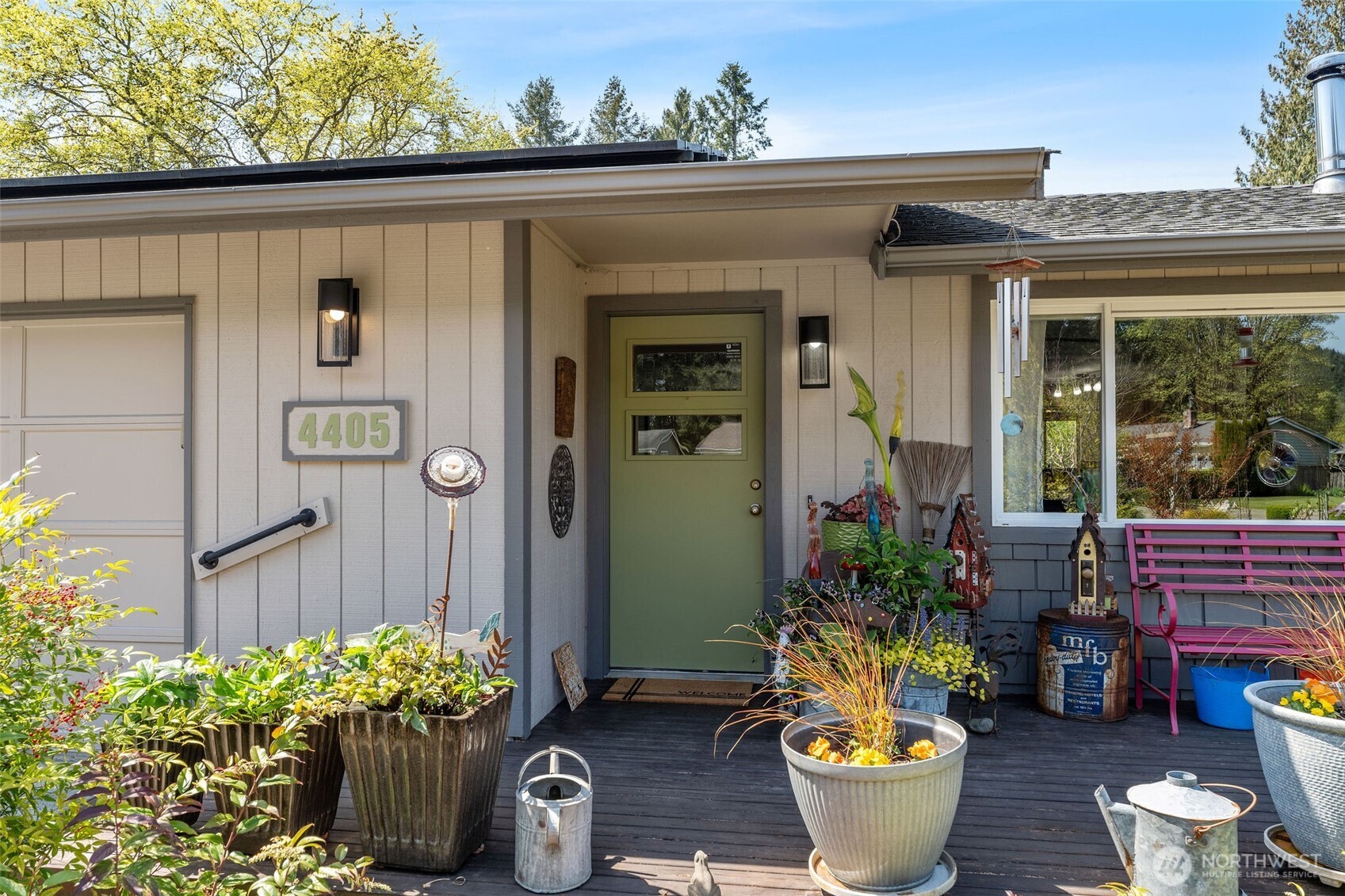 4405 Royal Court Carnation, WA 98014 - Photo 5 of 34 a front view of a house with outdoor seating