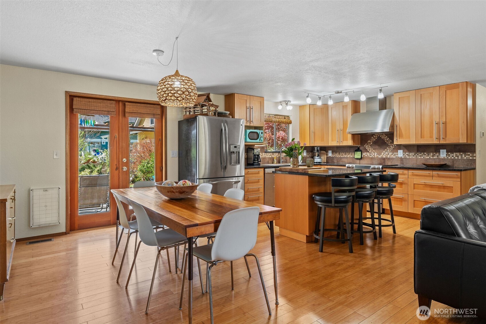 4405 Royal Court Carnation, WA 98014 - Photo 8 of 34 a view of a dining room with furniture window and wooden floor