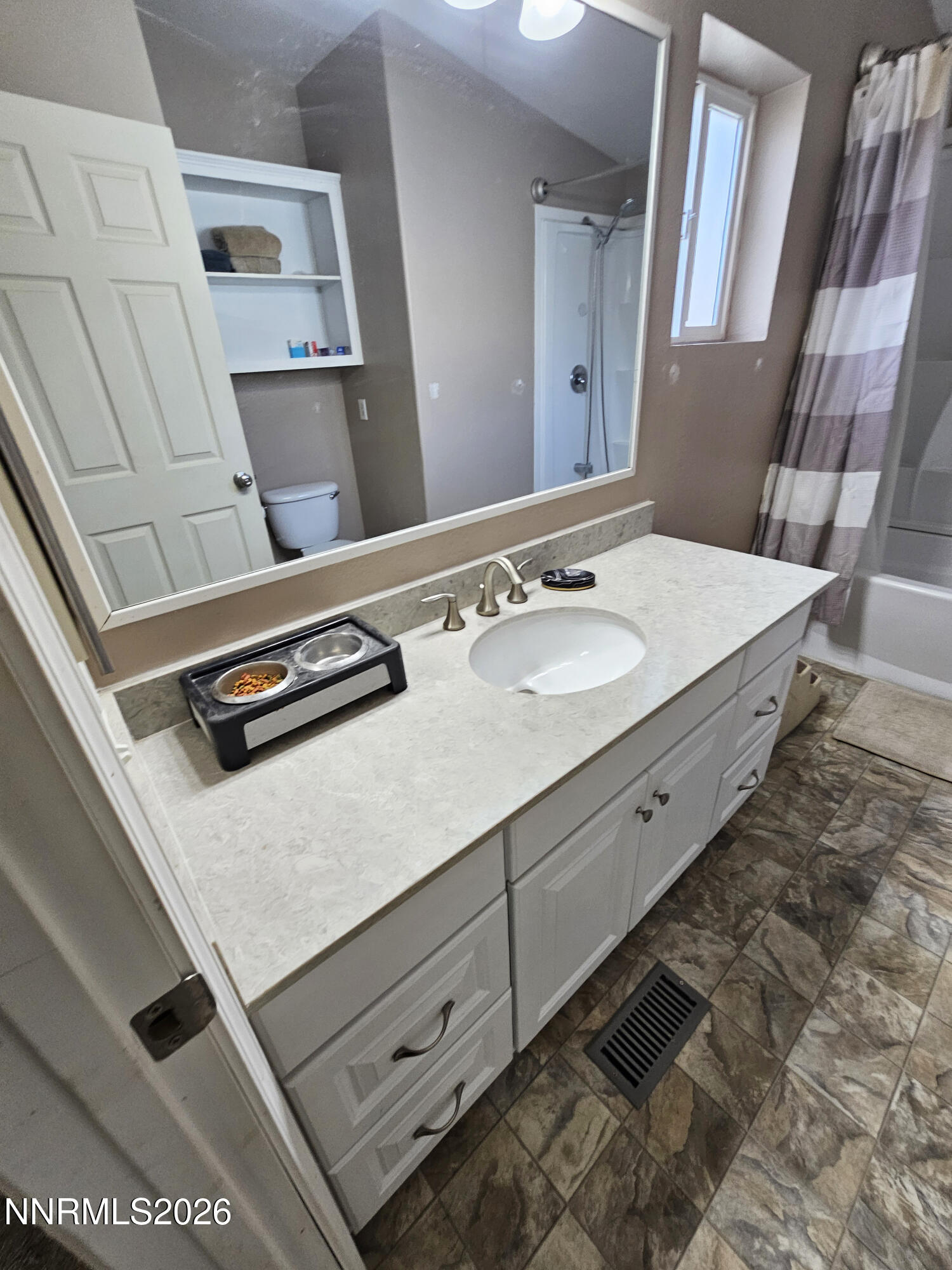 1125 Rancho Road Fernley, NV 89408 - Photo 19 of 47 a bathroom with a sink and a mirror