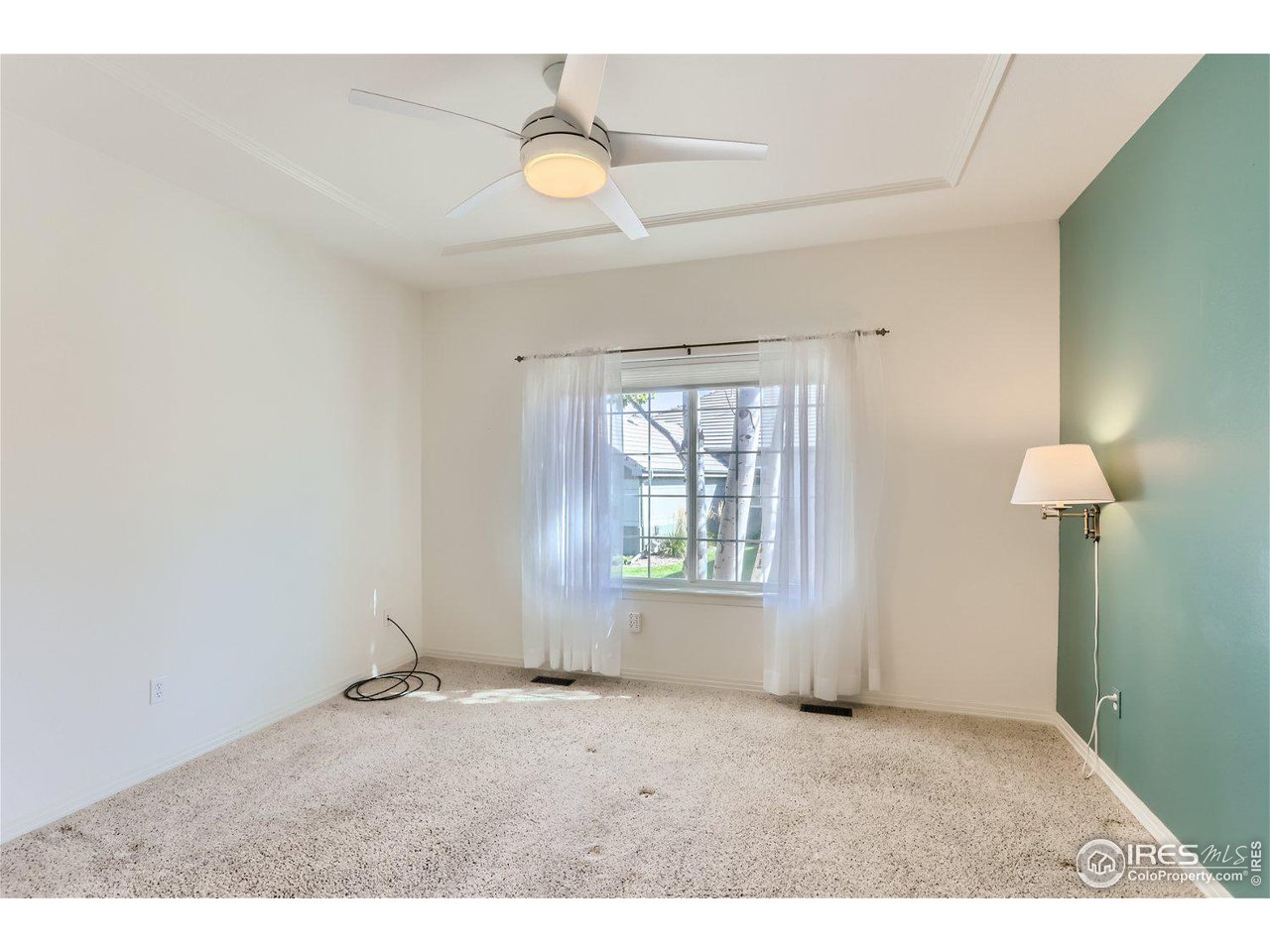 4159 Da Vinci Drive Longmont, CO 80503 - Photo 18 of 32 a view of an empty room and window