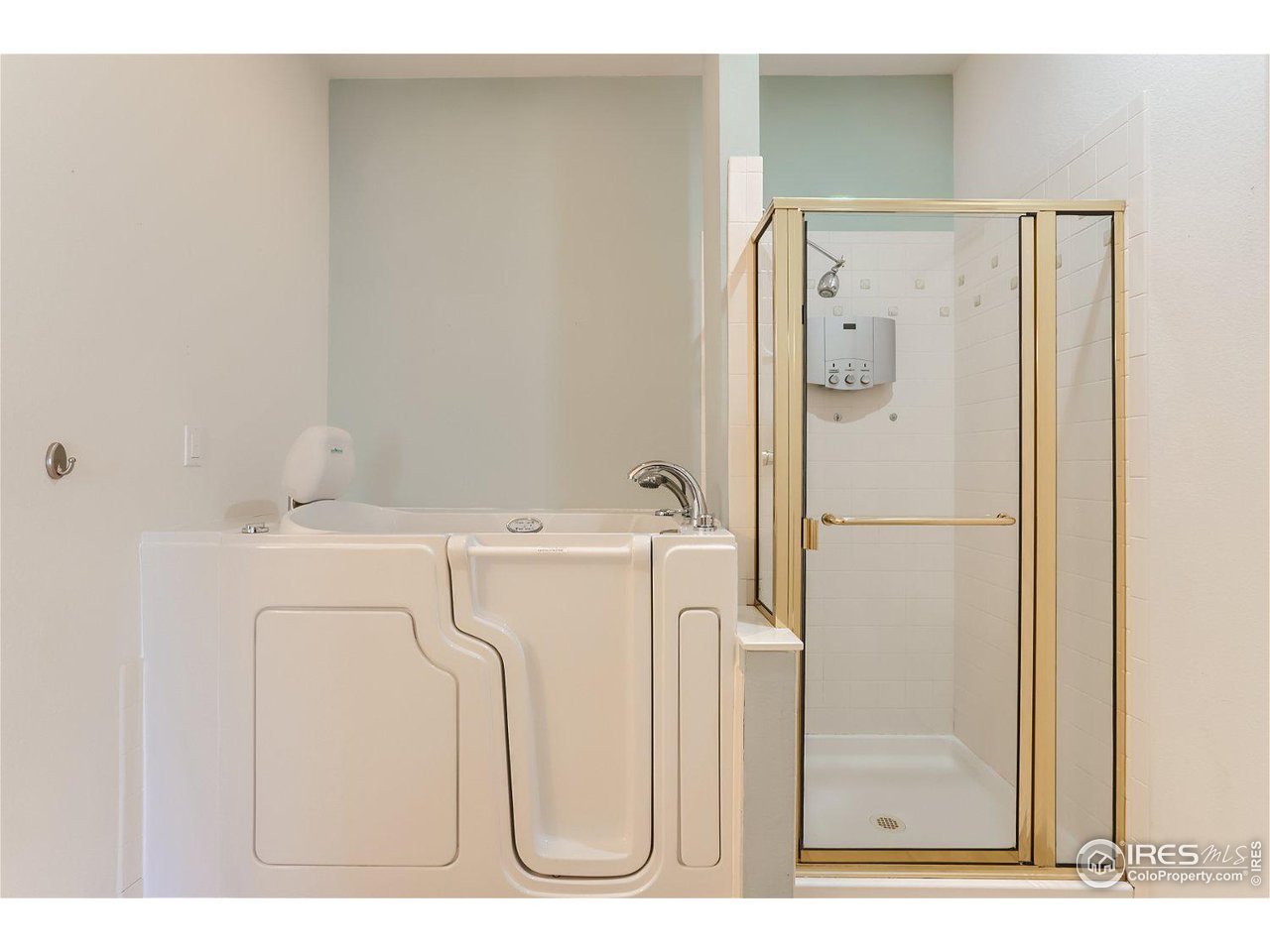 4159 Da Vinci Drive Longmont, CO 80503 - Photo 21 of 32 a utility room with dryer and washer