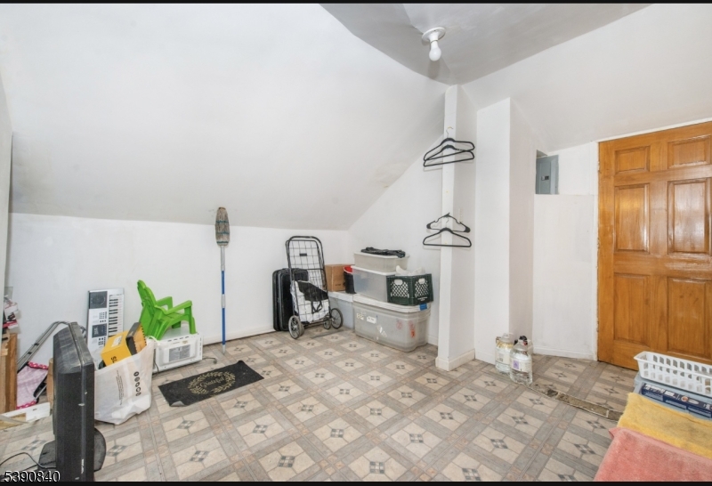 377-379 Ellison Street Paterson, NJ 07501 - Photo 21 of 28 a living room with furniture