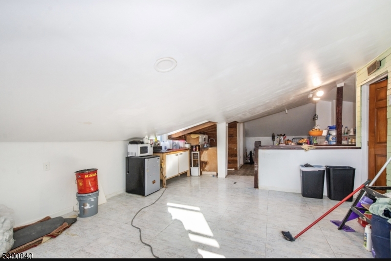 377-379 Ellison Street Paterson, NJ 07501 - Photo 23 of 28 a view of workspace with furniture and window