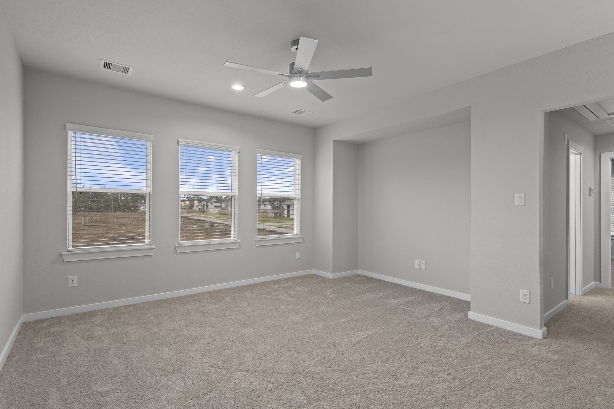 2116 Golden Spruce Court Conroe, TX 77301 - Photo 13 of 28 a view of an empty room with a window