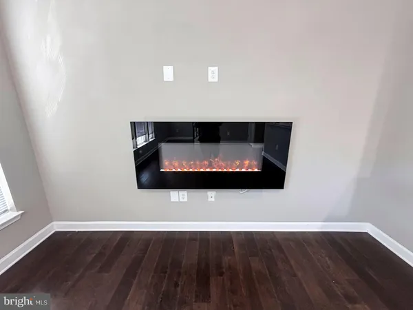 a living room with wooden floor