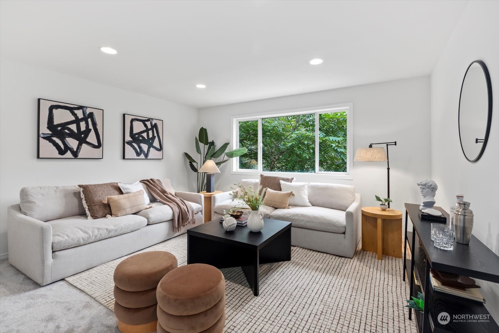 22920 53rd Avenue Southeast Bothell, WA 98021 - Photo 12 of 40 a living room with furniture and a large window