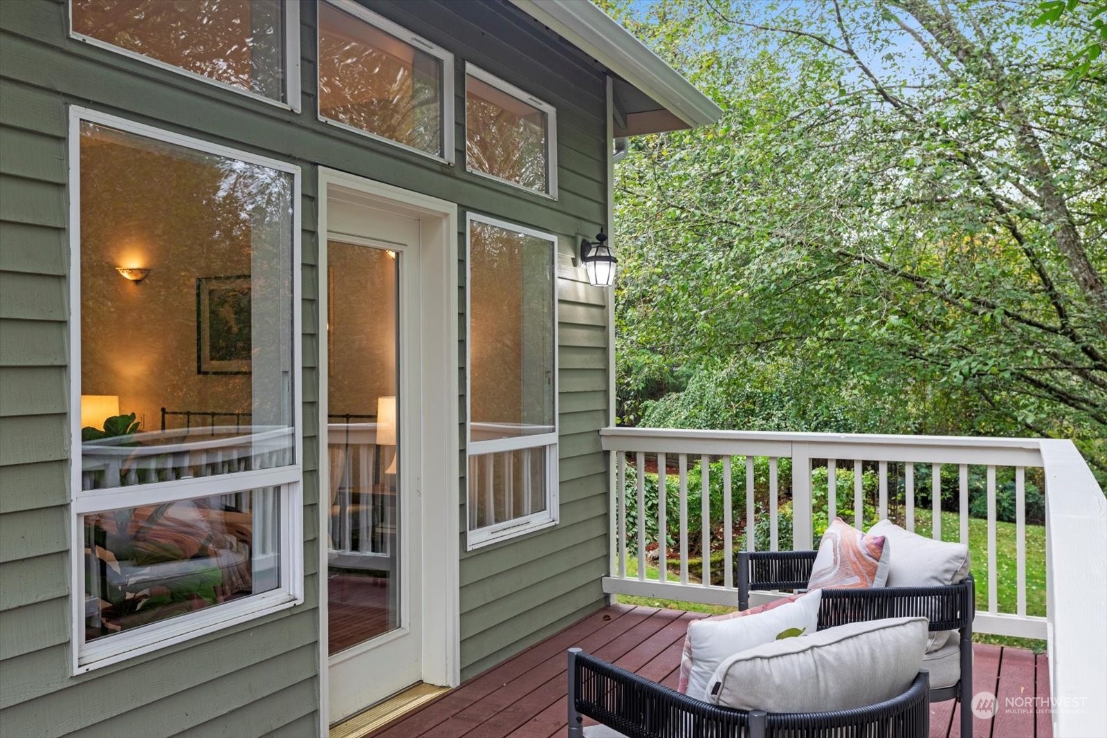 22920 53rd Avenue Southeast Bothell, WA 98021 - Photo 20 of 40 a view of a chair and table in the balcony