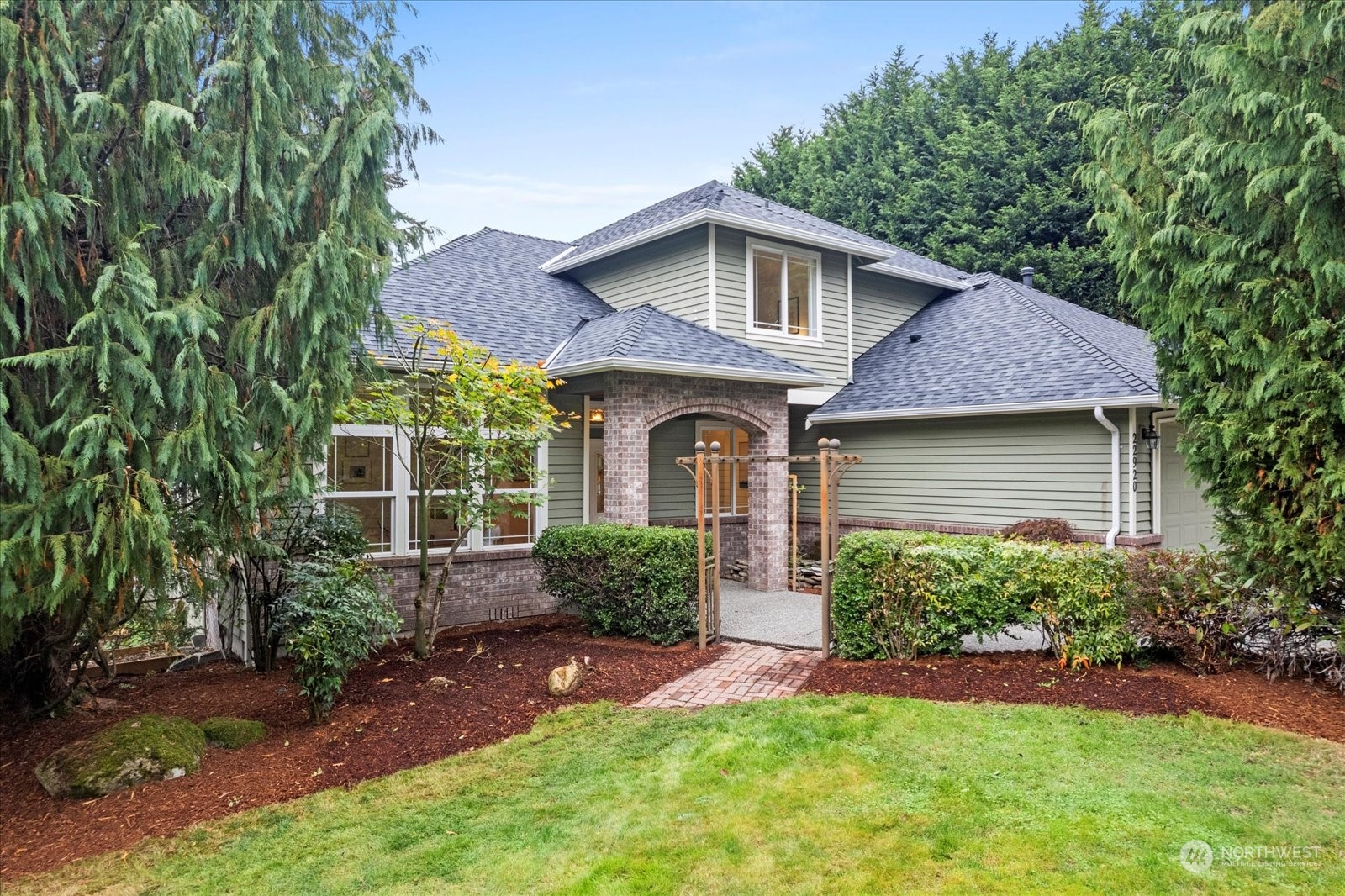 22920 53rd Avenue Southeast Bothell, WA 98021 - Photo 2 of 40 front view of a house with a yard