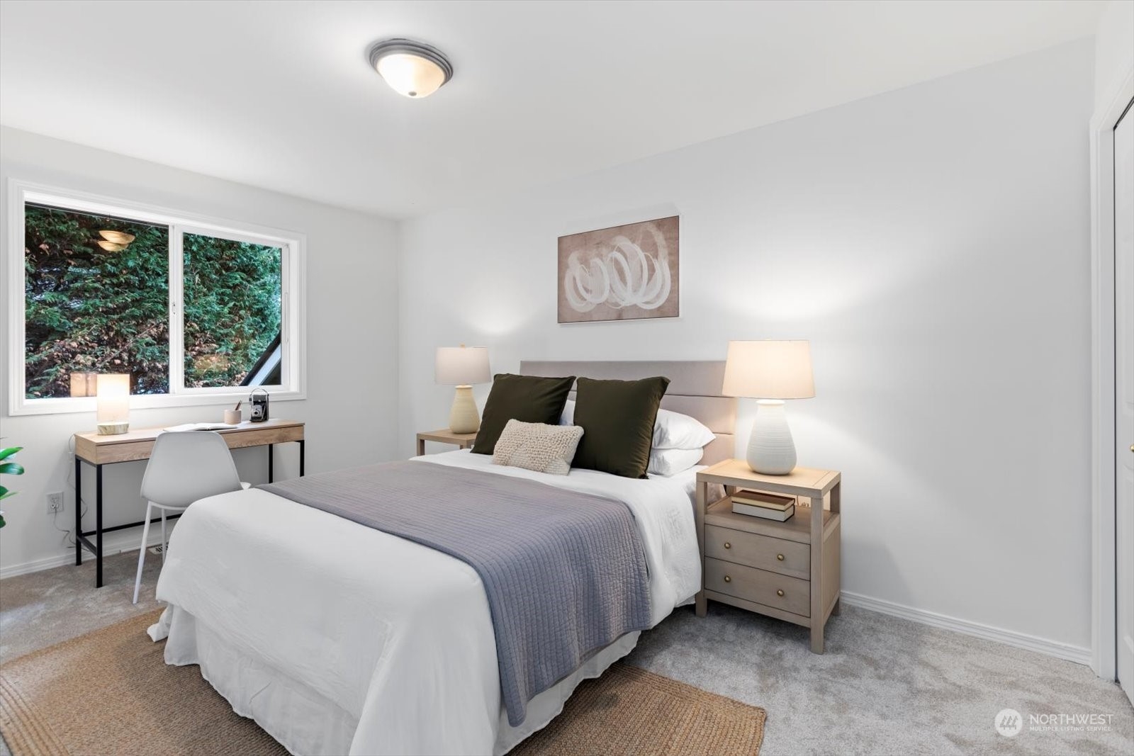 22920 53rd Avenue Southeast Bothell, WA 98021 - Photo 23 of 40 a bedroom with double bed and a large window