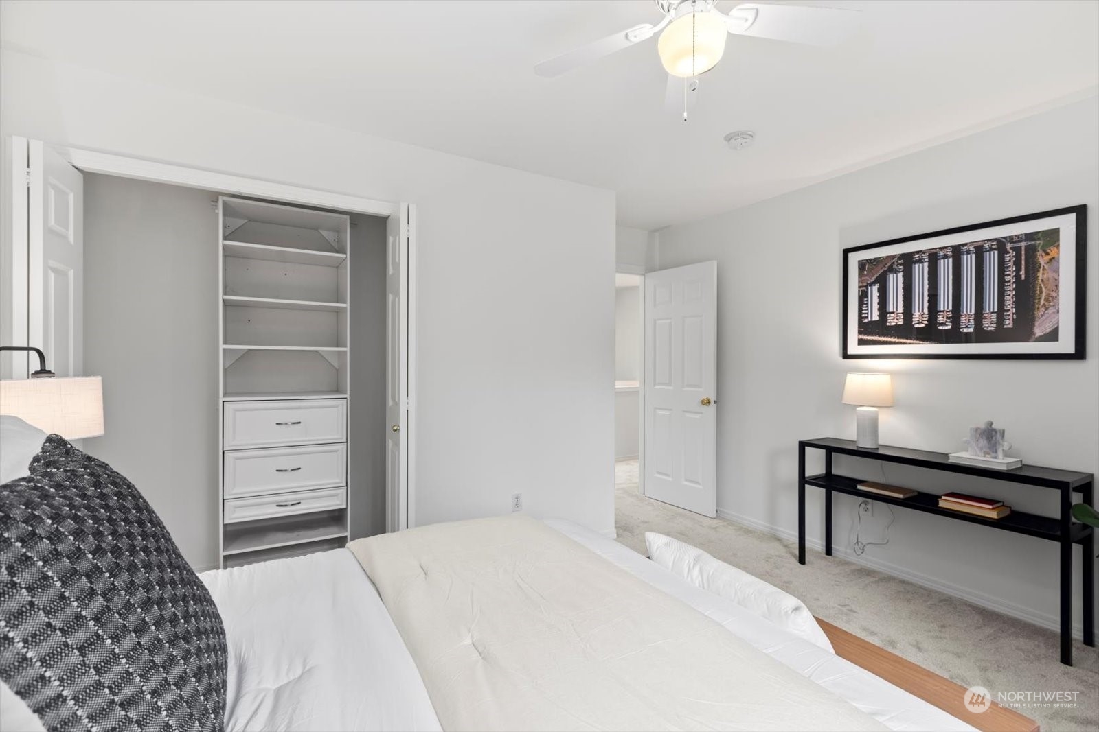 22920 53rd Avenue Southeast Bothell, WA 98021 - Photo 27 of 40 a bedroom with a bed and a chandelier