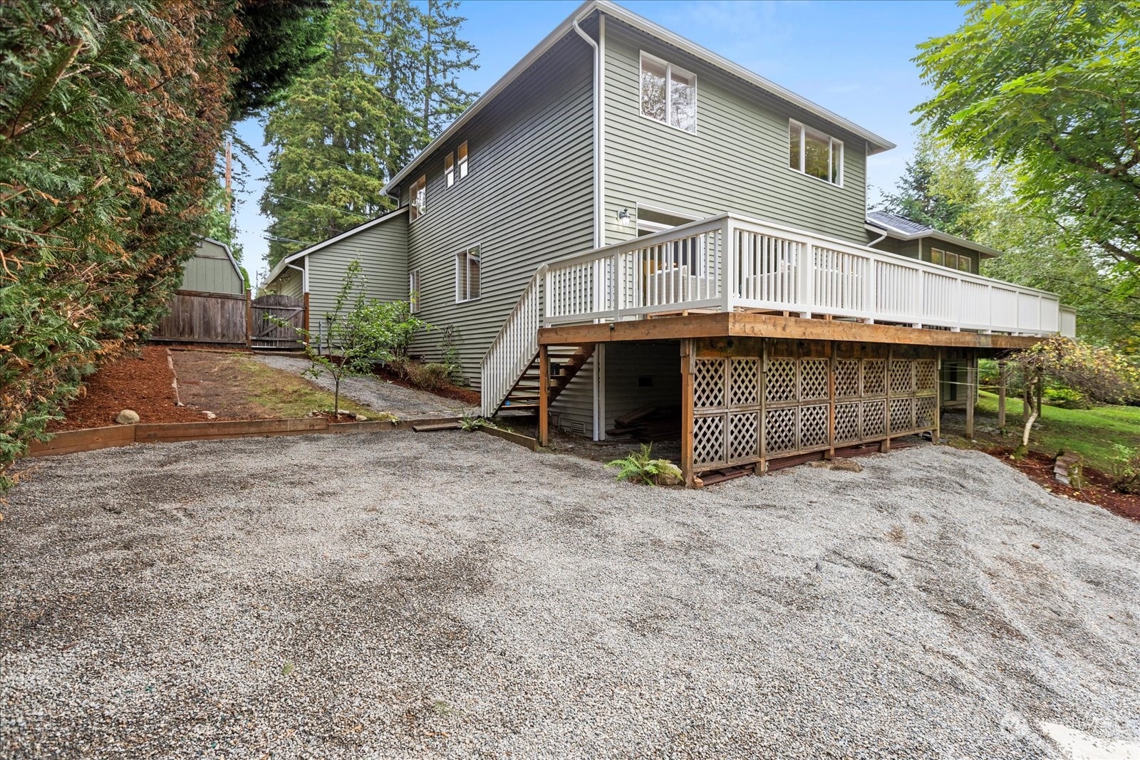 22920 53rd Avenue Southeast Bothell, WA 98021 - Photo 33 of 40 a view of a house with a yard