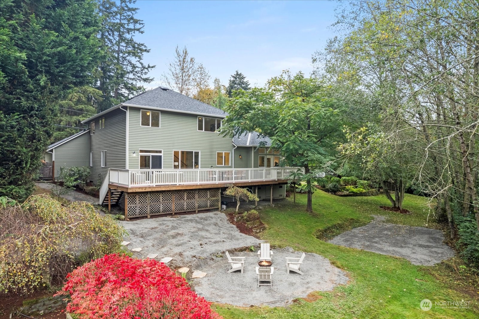 22920 53rd Avenue Southeast Bothell, WA 98021 - Photo 34 of 40 a view of a house with backyard sitting area and garden