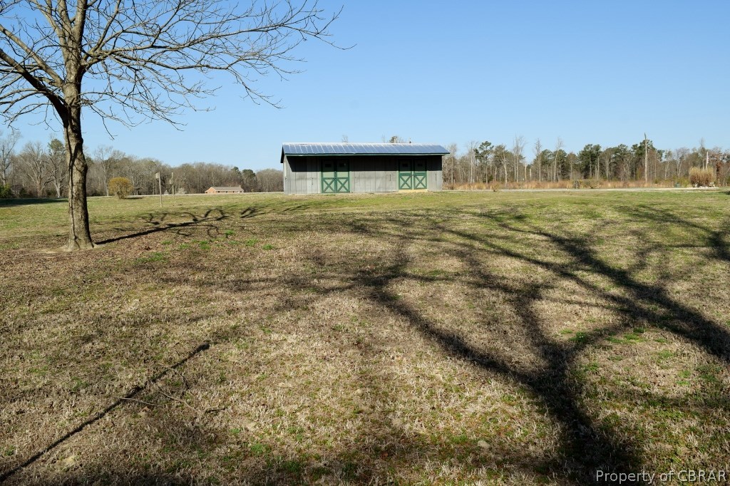 4288 Cedar Bush Road Hayes, VA 23072 - Photo 38 of 48 Barn with plenty of cleared land for horses.