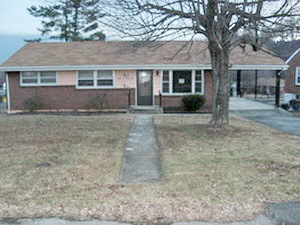 4644 Elva Road Northwest Roanoke, VA 24017 - Photo 1 of 9 front view of a house with a yard