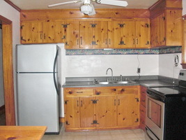 4644 Elva Road Northwest Roanoke, VA 24017 - Photo 4 of 9 a kitchen with stainless steel appliances granite countertop a granite counter tops and a refrigerator