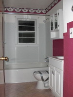 4644 Elva Road Northwest Roanoke, VA 24017 - Photo 8 of 9 a bathroom with a toilet and a shower
