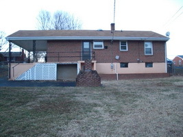 4644 Elva Road Northwest Roanoke, VA 24017 - Photo 9 of 9 a front view of a house with garden