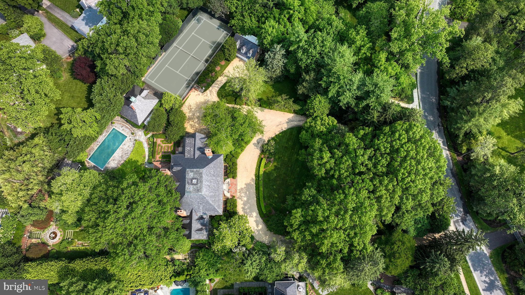 7116 Glenbrook Road Bethesda, MD 20814 - Photo 1 of 30 an aerial view of a house with a yard and garden