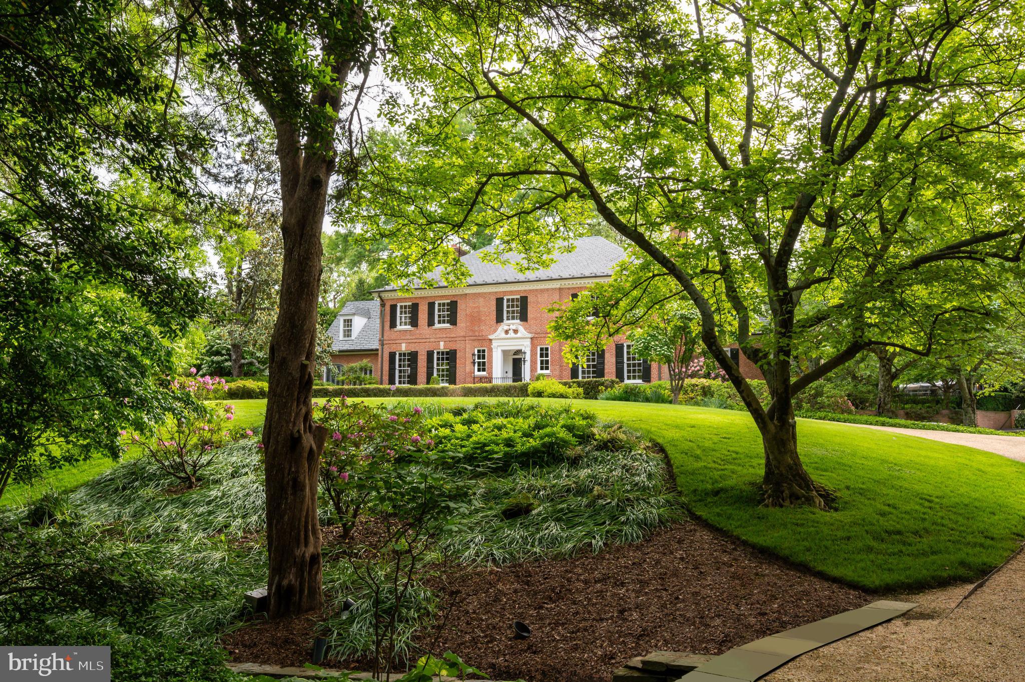7116 Glenbrook Road Bethesda, MD 20814 - Photo 4 of 30 a view of a house with backyard and a tree