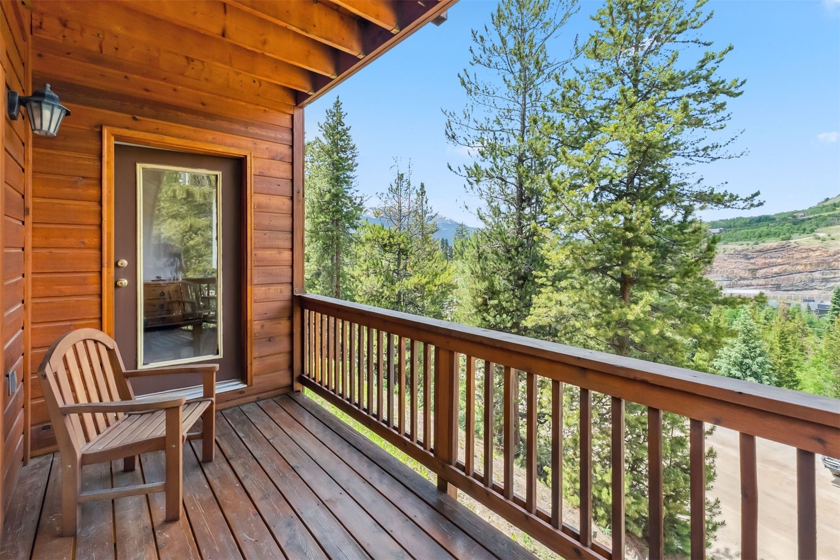 129 Lookout Ridge Drive, Unit 129 Dillon, CO 80435 - Photo 16 of 25 Second Deck Off Of The Primary Bedroom & 2nd Bedroom