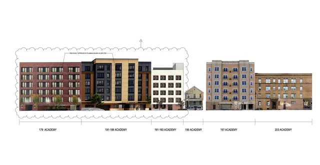 a view of buildings with a street