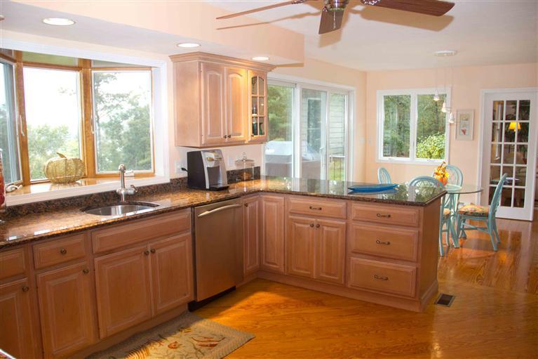 17 Preakness Lane Mashpee, MA 02649 - Photo 8 of 34 a kitchen with sink and large window