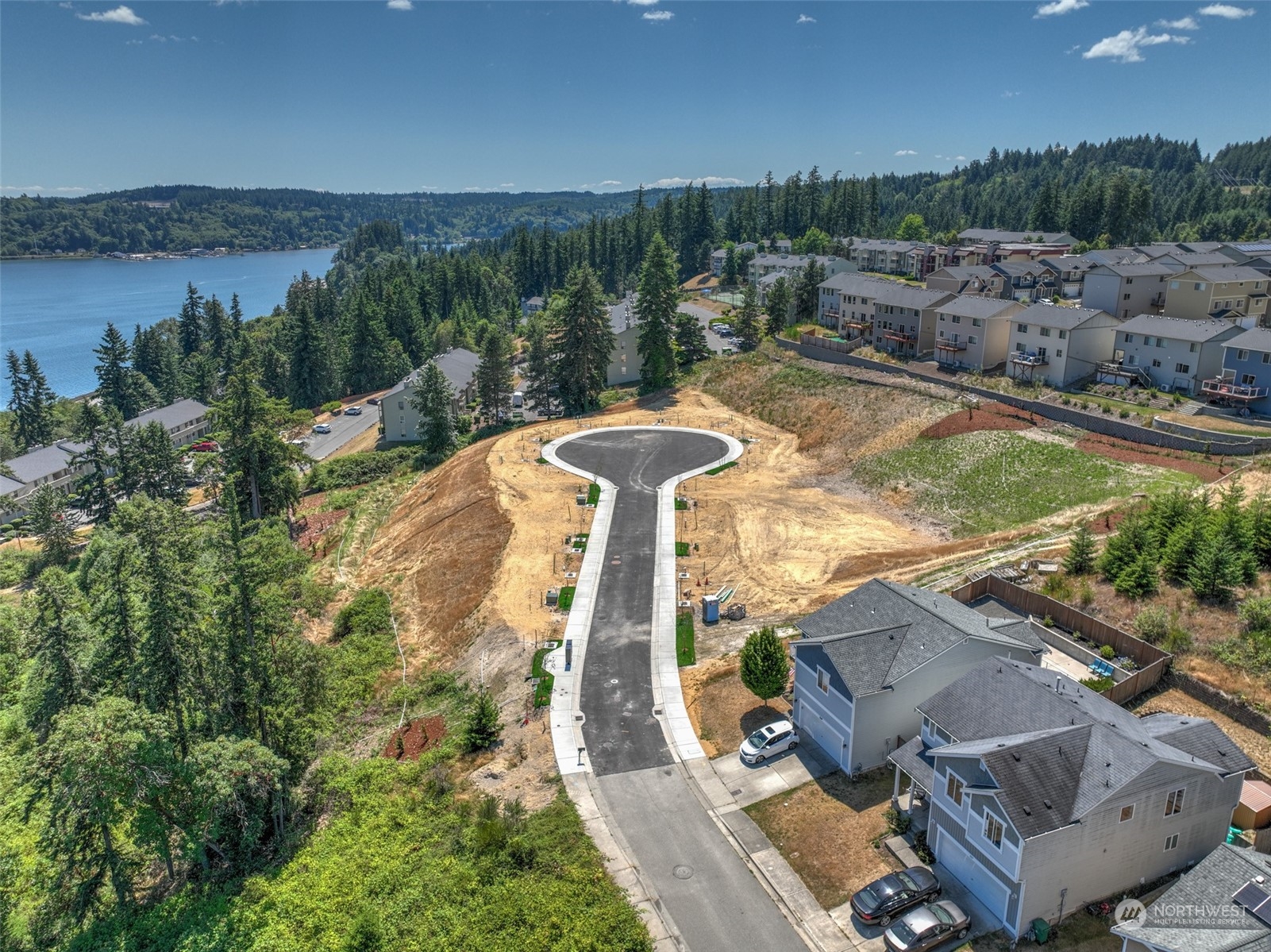 0 Sound Ridge Drive Bremerton, WA 98312 - Photo 3 of 13 a view of a swimming pool with a patio