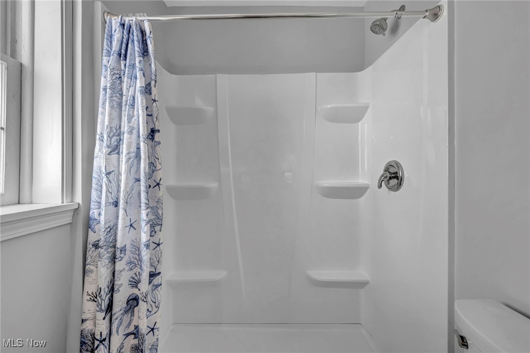 5639 Trumbull Road Geneva, OH 44041 - Photo 16 of 35 Full bathroom featuring a shower stall