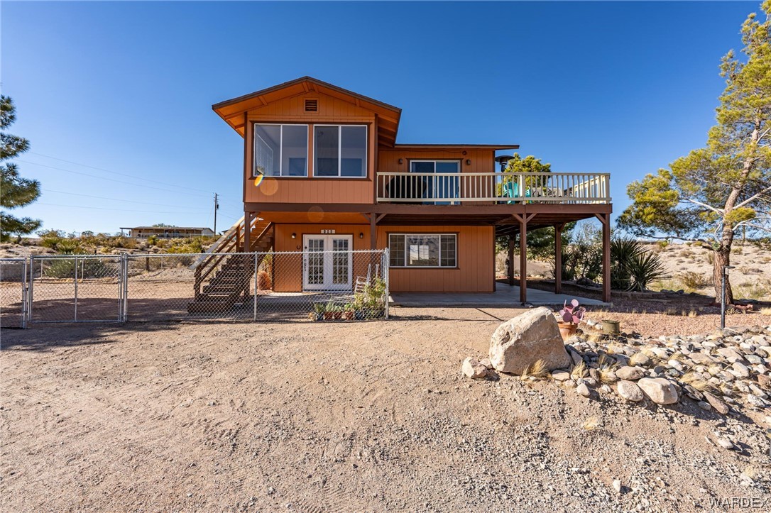 180 Sunfish Way Meadview, AZ 86444 - Photo 1 of 42 a front view of a house with a yard